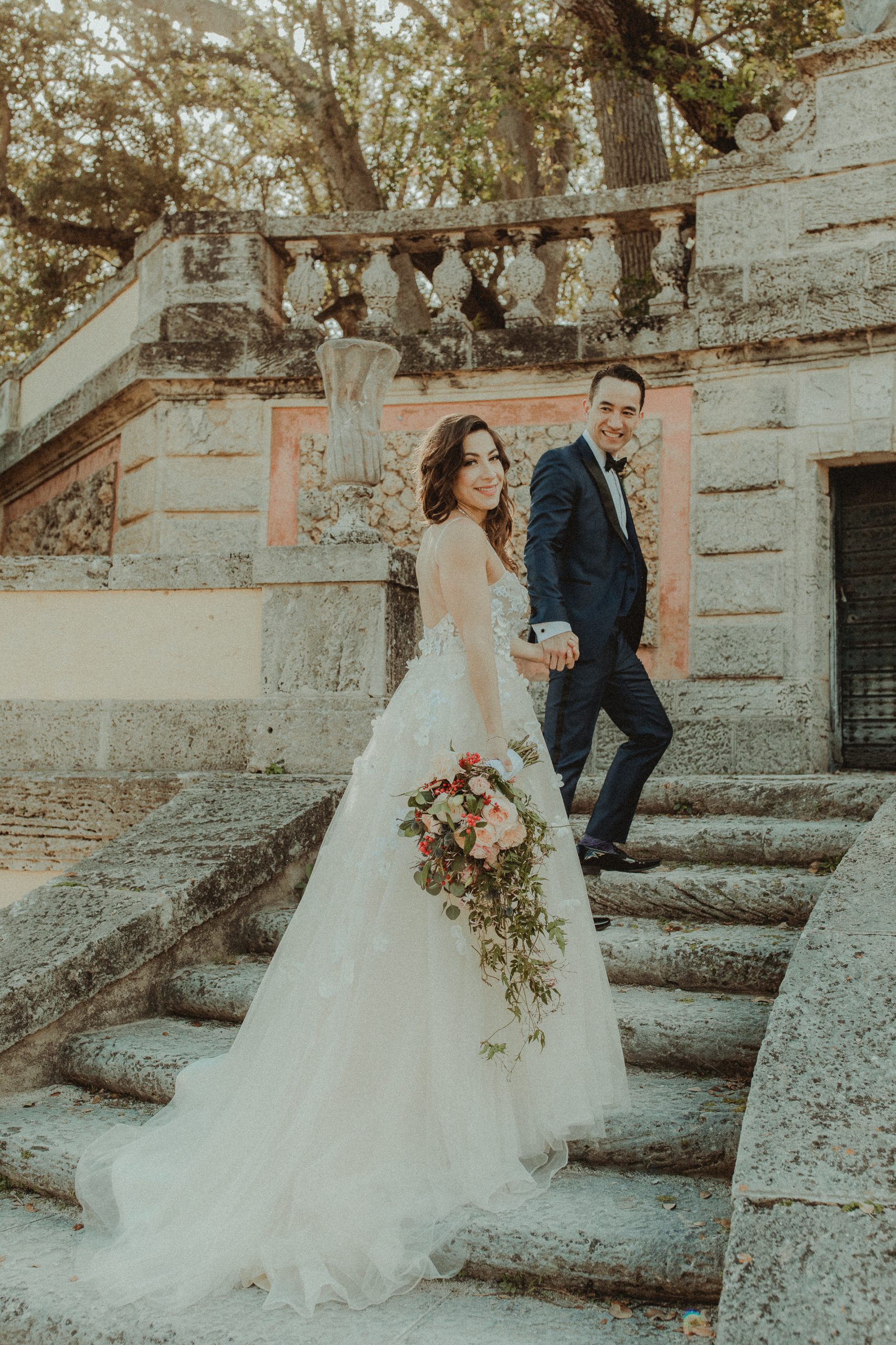 Wedding couple portrait in the formal gardens at Vizcaya Museum and Gardens in Miami